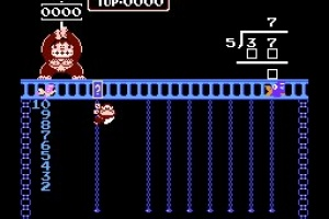 DK Jr. receives a math lesson.